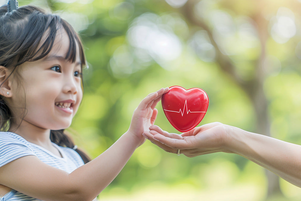  A happy, healthy elementary school student smiling in the sun, symbolizing a strong inner immune system